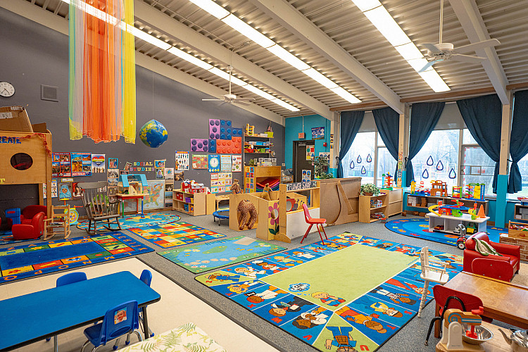 Wide shot of a classroom with toys