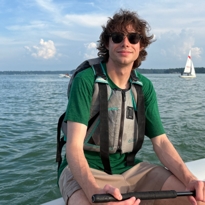 Billy Kedley in a lifejacket on a boat