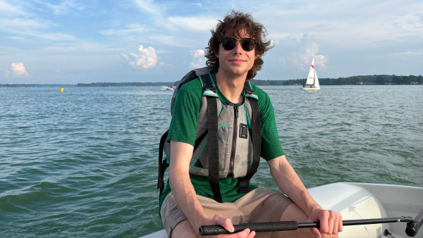 Billy Kedley in a lifejacket on a boat