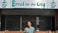 Leah Siegmann standing outside the entrance to Bread for the City, where she interned.