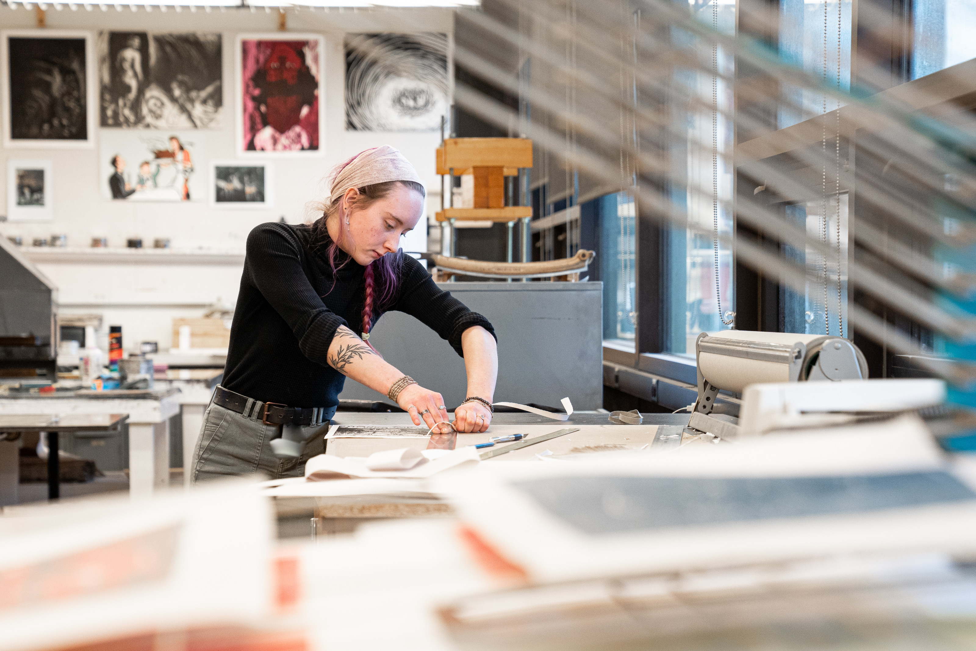 Student in a printmaking lab