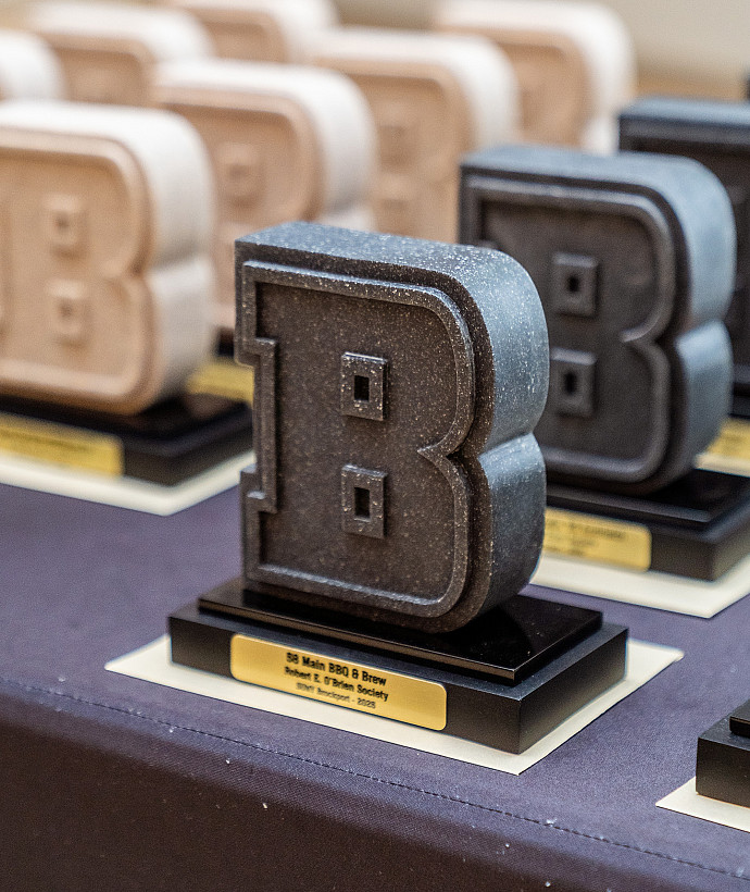 Close up of donor award in shape of the letter B.
