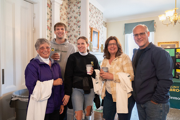 Group of people inside Alumni House