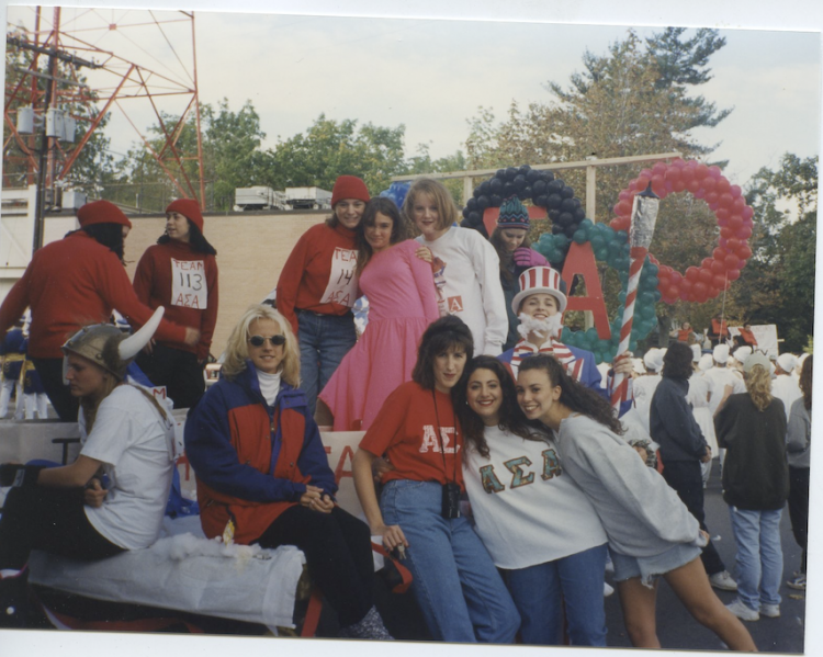 Group of people in sorority merch.
