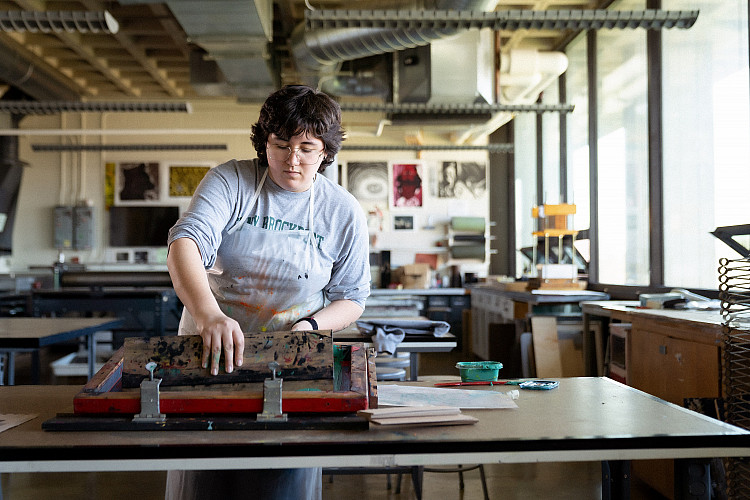 Students in the art facilities print making