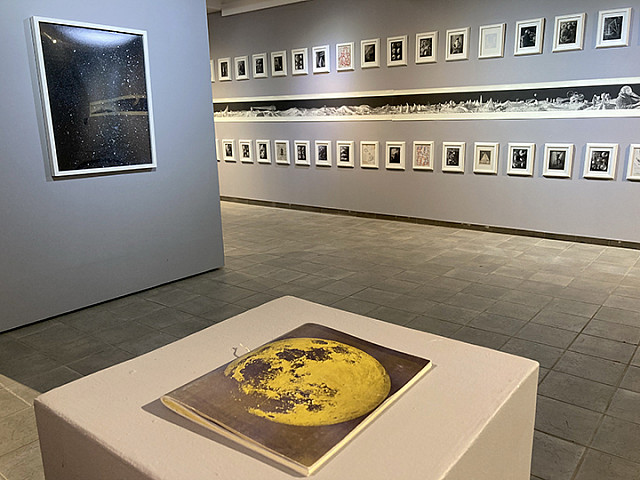 Sun and moon art pieces displayed at the 2024 Student Art and Design Exhibit