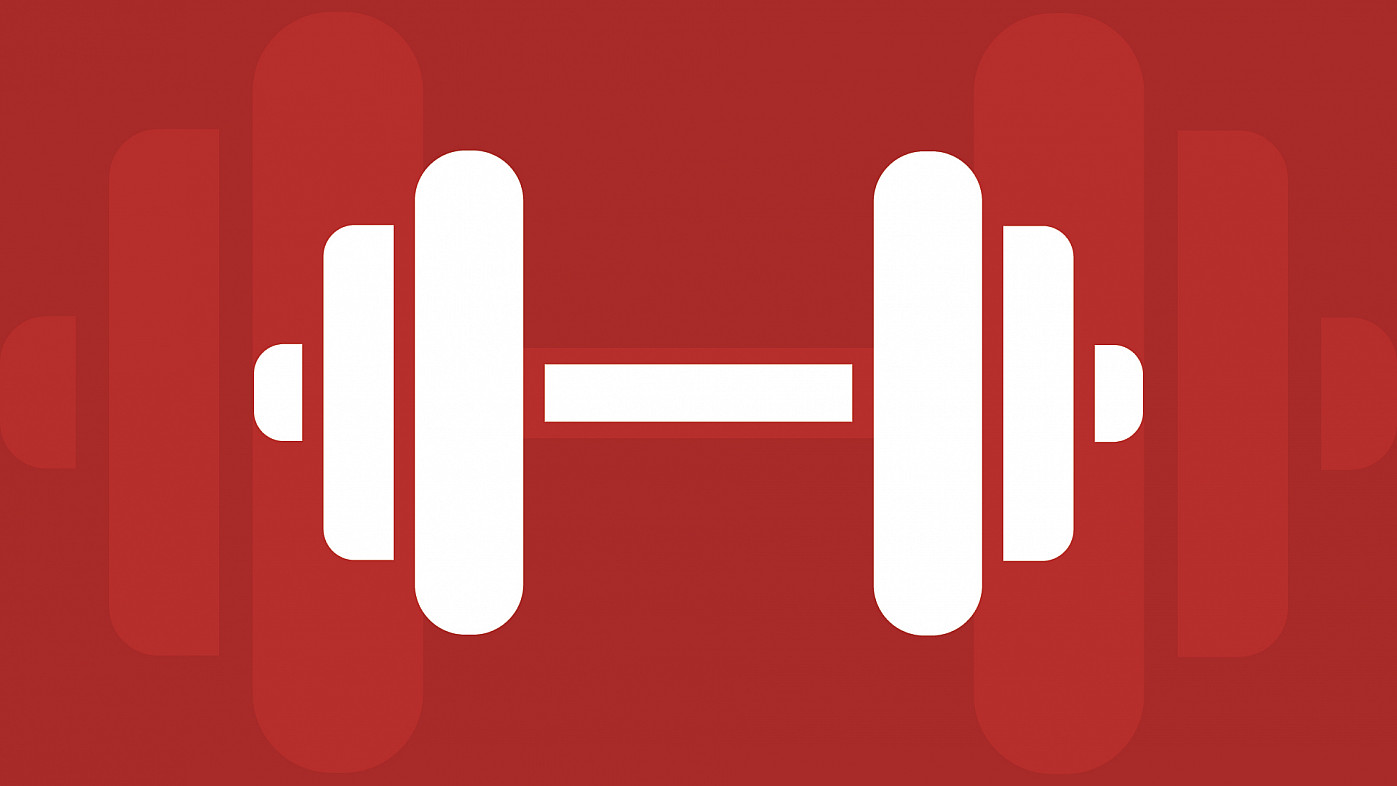 a weight over a red background.
