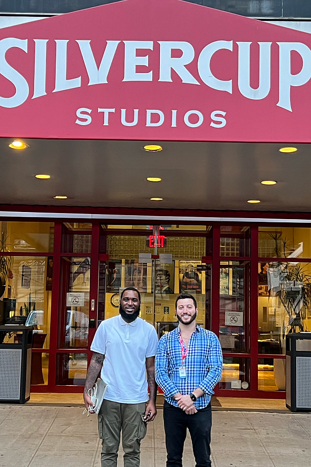 Tyrick LaForce '22 and Dave Weilert '14 in front of Silver Cup Studios.