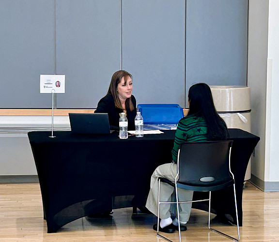 Student participating in mock interview during the Careers in Computing event