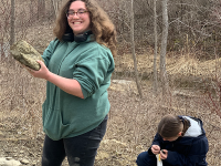 Geology students showing off rocks they've collected