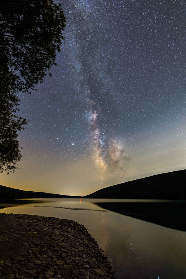 Shot of a river and visible Milky Way at Candice Lake by Margy Meath