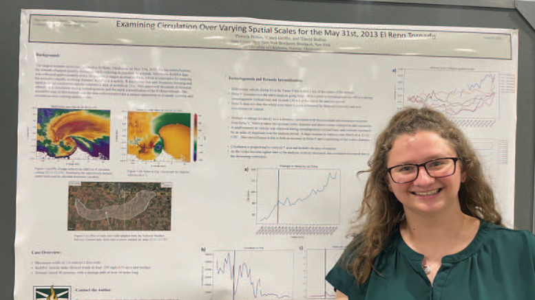 Tricia Hutton standing next to her presentation board at the American Meteorological Society