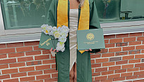 Nursing alum Shaelyn Bopp in her cap and gown