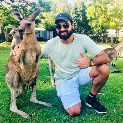 Pankaj posing with a Kangaroo in Australia
