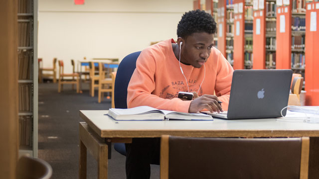 student studying library