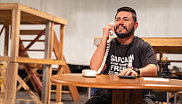 Actor performing a scene in Water by the Spoonful