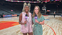 Cassandra Negley (right) reporting courtside for Yahoo Sports.