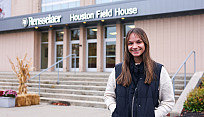 Caitlyn DeLuca in front of the RPI ice hockey area, the Houston Field House.