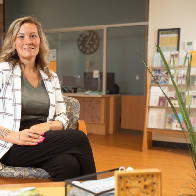 Healthcare Administration alum, Cassandra McCormack, in the Hazen Center for Integrated Care lobby.
