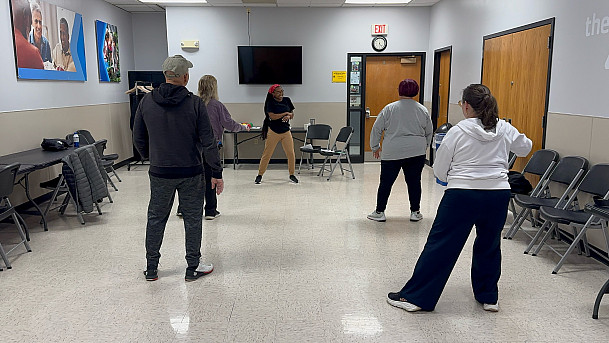 Anaheysha Baptiste-White leading a movement class at the YMCA for the Livestrong program.