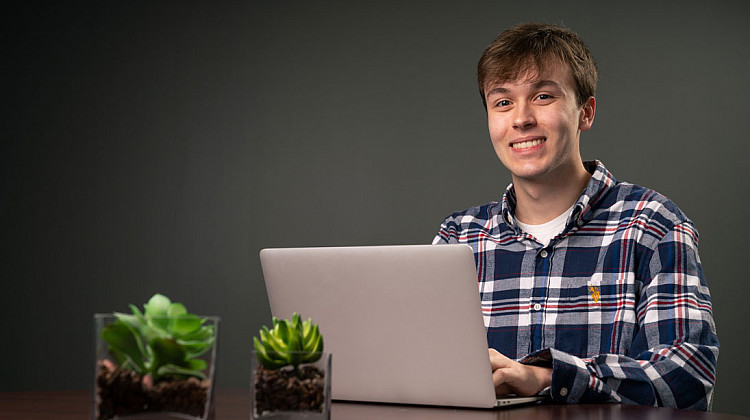 Matthew Morgan using a computer