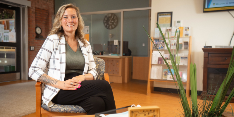 Healthcare Administration alum, Cassandra McCormack, in the Hazen Center for Integrated Care lobby.